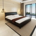 Double bed with mattress imitation leather black 180x200 cm